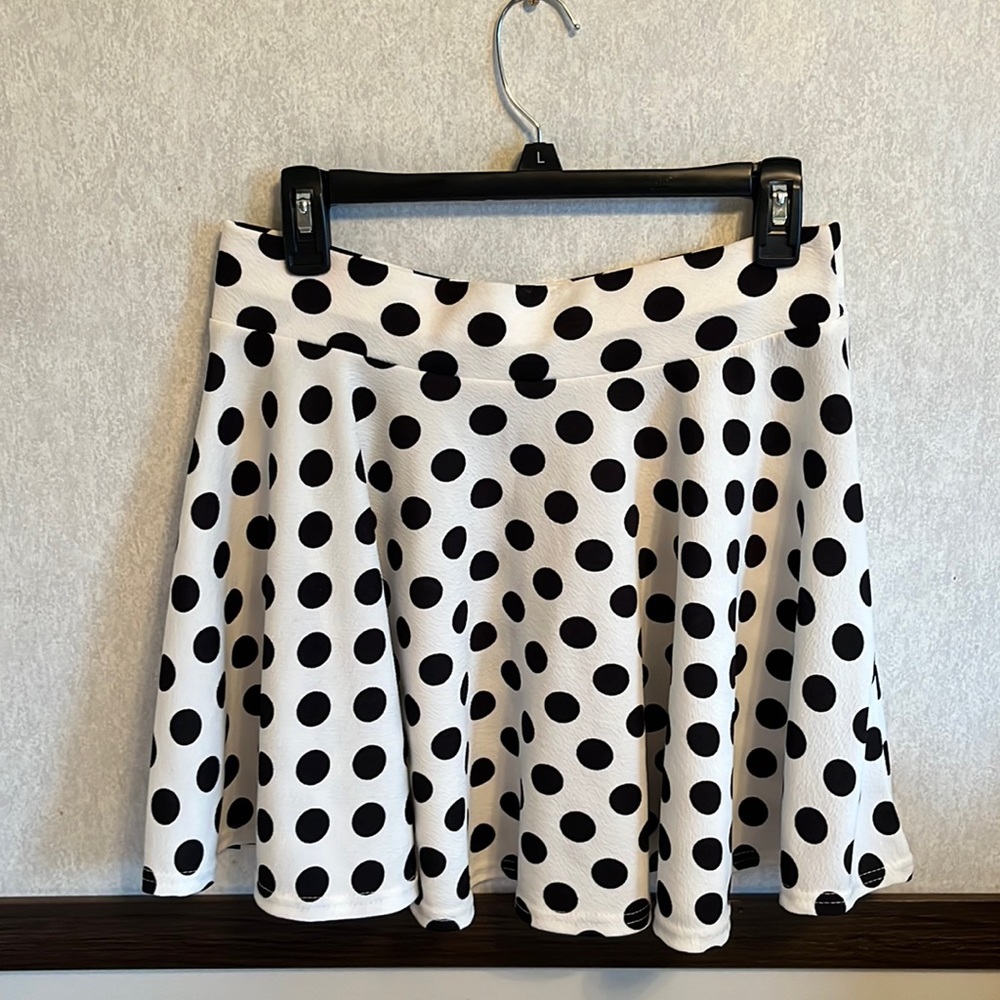 Fun white with black polka dots mini skirt.